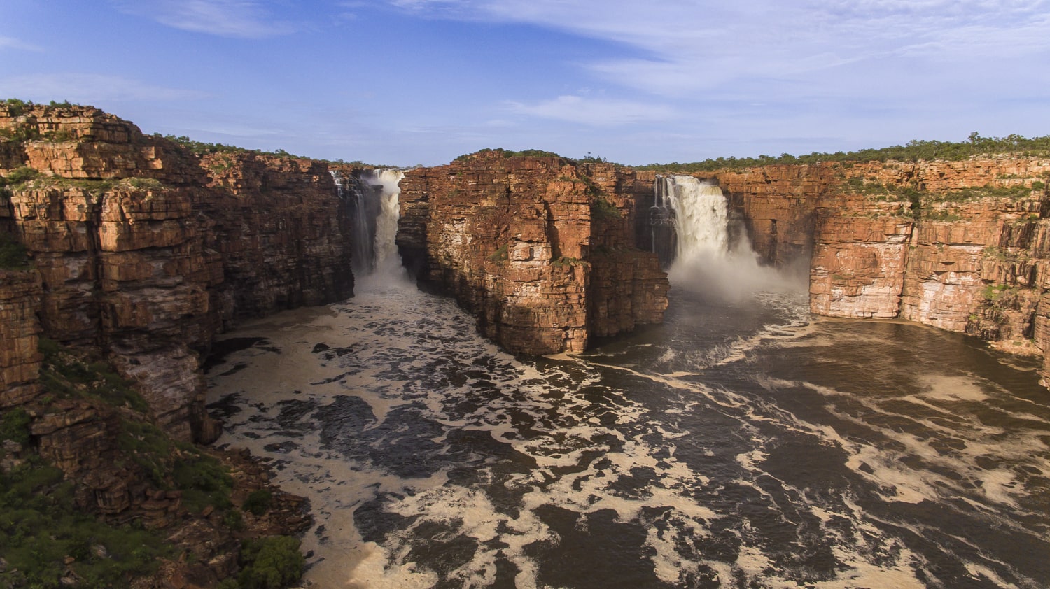 Powerful twin waterfalls at King George Falls in full flow